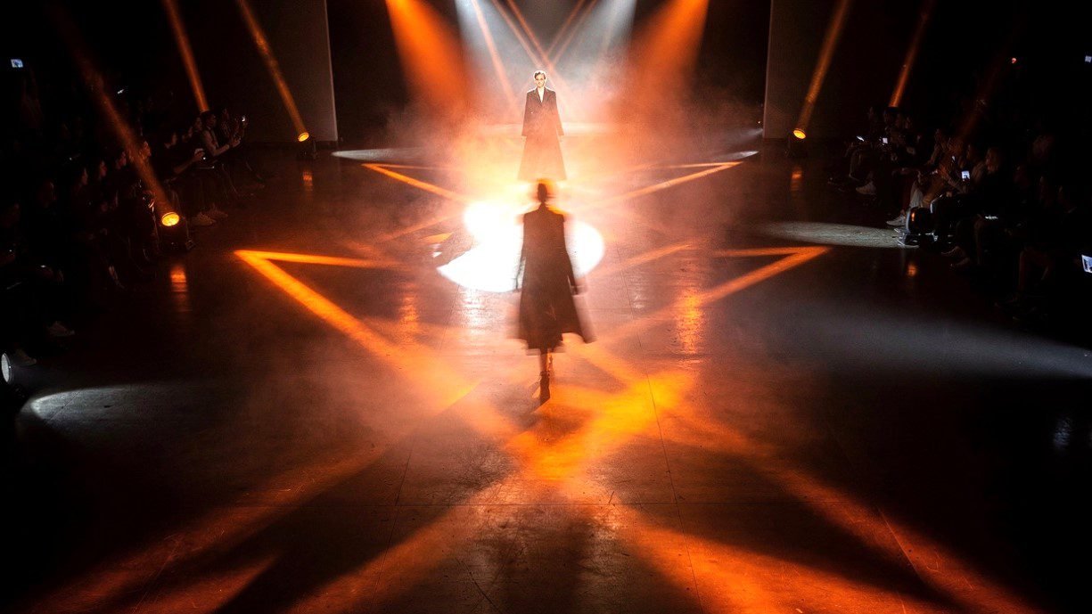 a-dramatic-fashion-week-runway-from-above-dark-ven